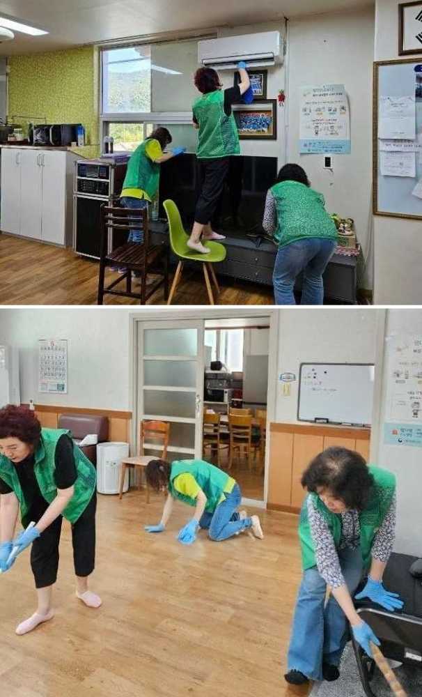 ▲둔덕동 새마을부녀회가 경로당을 청소하고 있다.