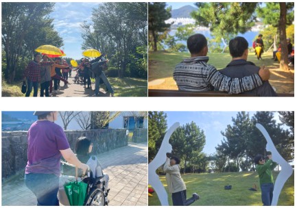 ▲ 산책로를 따라 걷고  있는 이용자와 활동지원사들